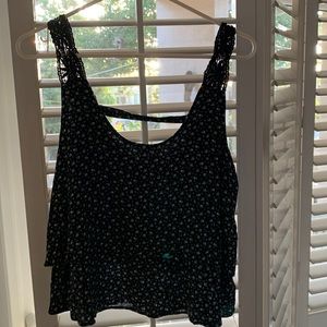 En creme tiered flowy floral top.